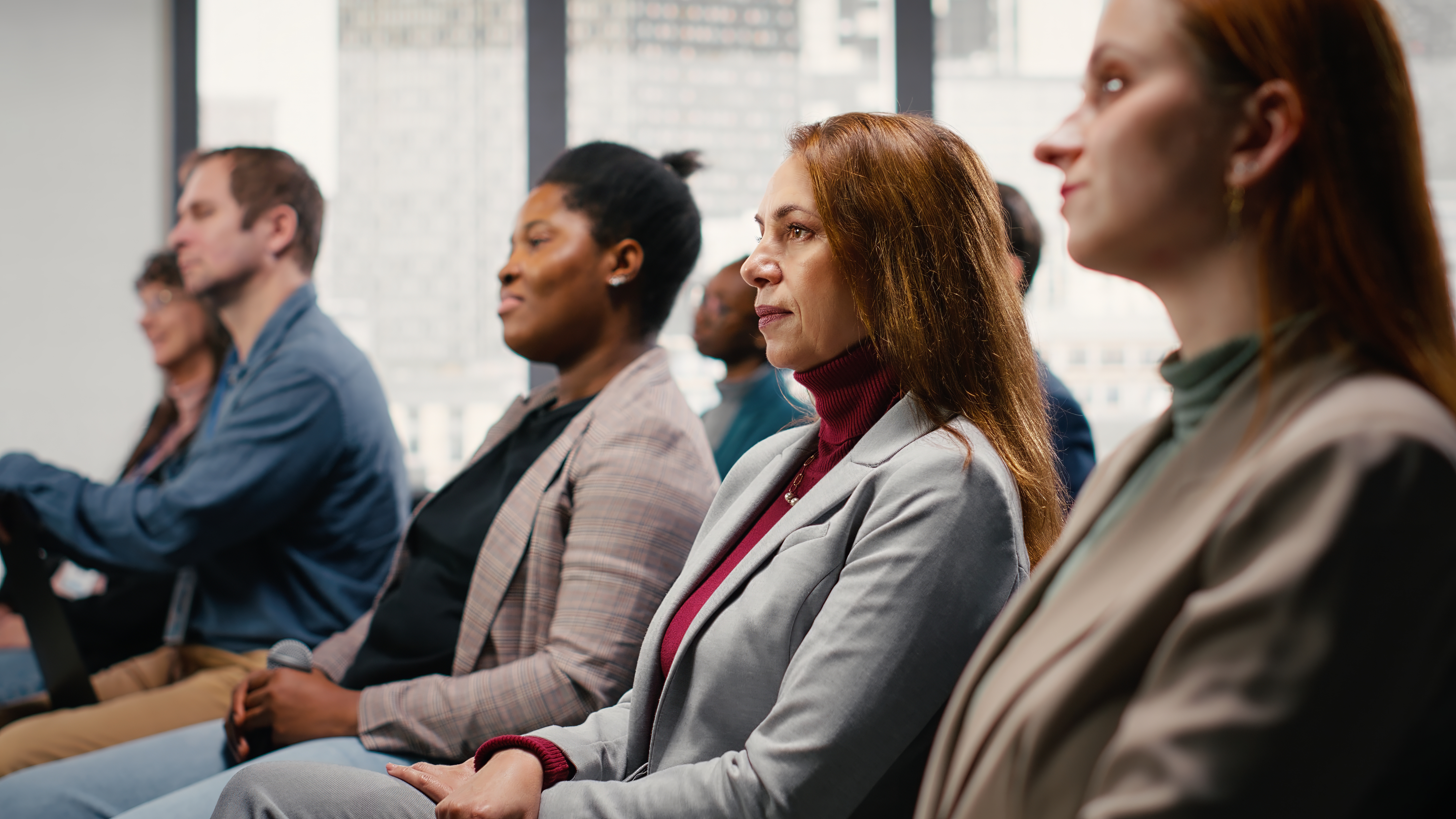 Business conference meeting featuring startup pitch and stage presentation. Diverse business people speakers addressing colleagues, participants and professionals during summit.